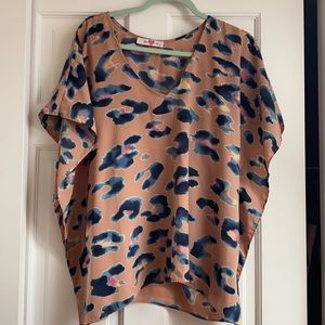 Multi color cheetah print statement top